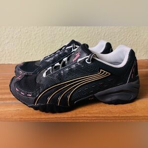 Puma Black Sneakers with Gold and Pink Accents